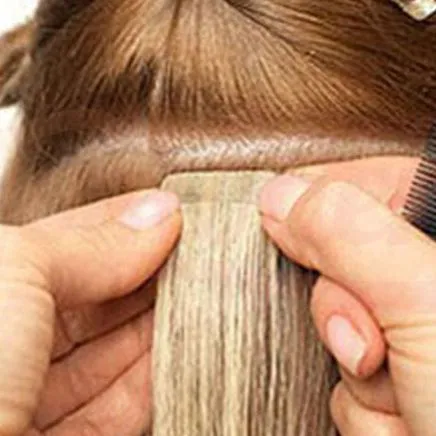Take second tape hair piece strip and press it firmly towords the under pieces